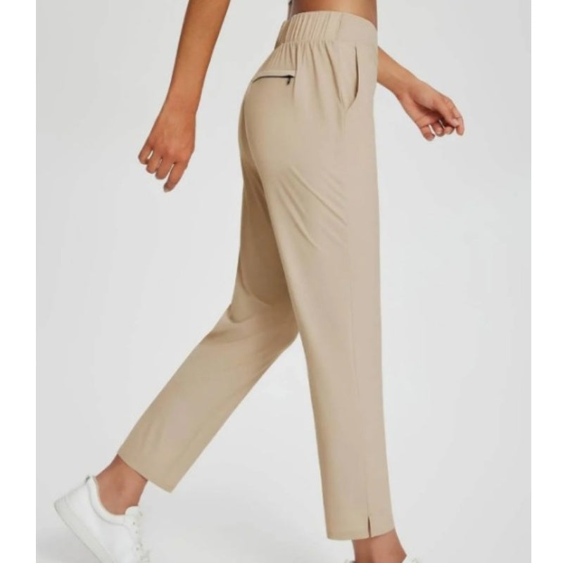 Pantalon élastique à taille haute avec poches zippées pour femmes