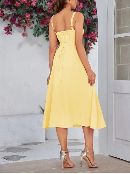 Séraphine – robe fluide fendue au décolleté noué