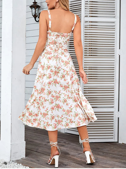 Bérénice – robe fleurie à bretelles et fente légère