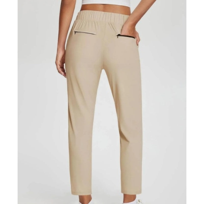 Pantalon élastique à taille haute avec poches zippées pour femmes